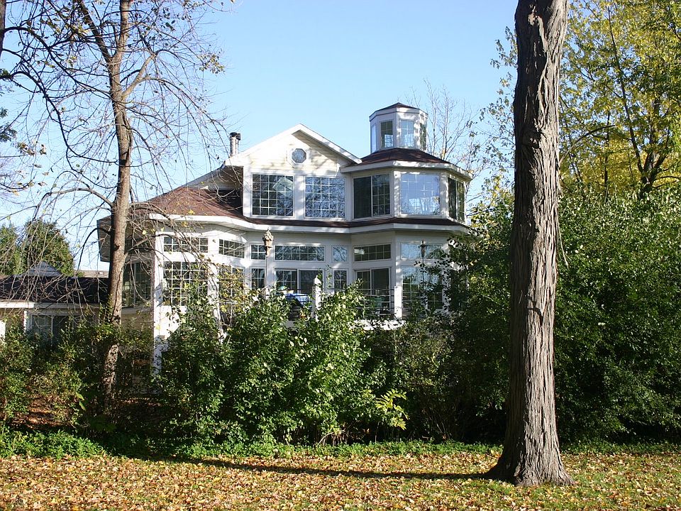 This house has 72 windows and is filled with light and views of the park and Lake Mendota.