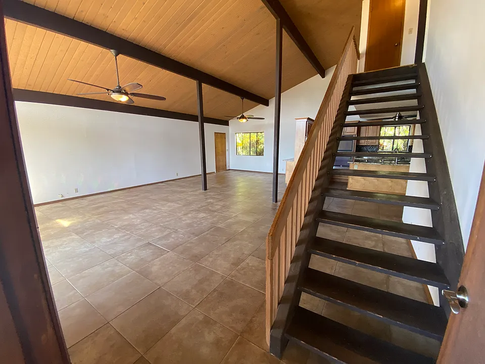 Front Entry + Unfurnished Living Room