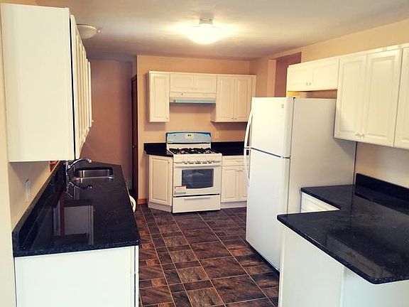 Newly renovated kitchen with granite countertops and all new