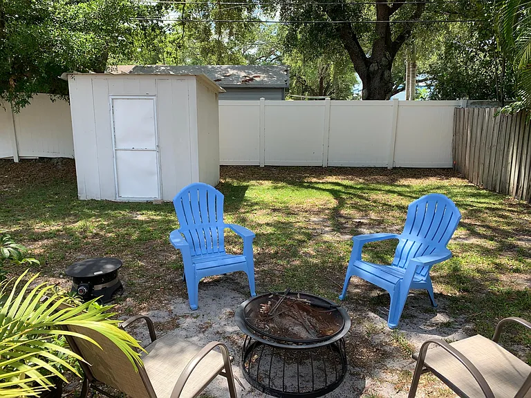 Back garden sitting area and shed