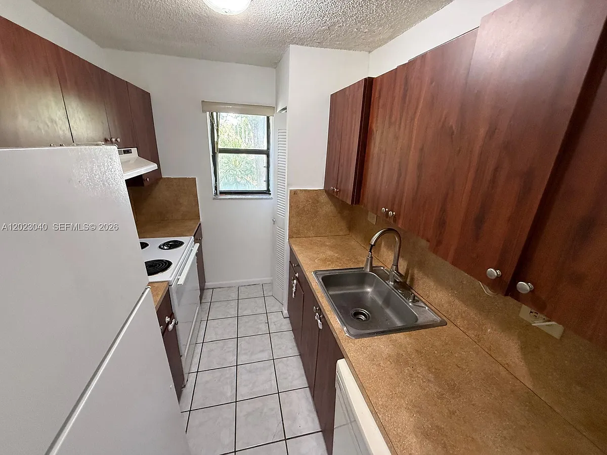 Building Photo - 6975 NW 179th St #204
