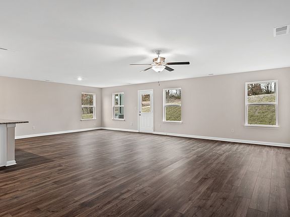 The spacious family room is the perfect space for sports watch parties and family movie nights