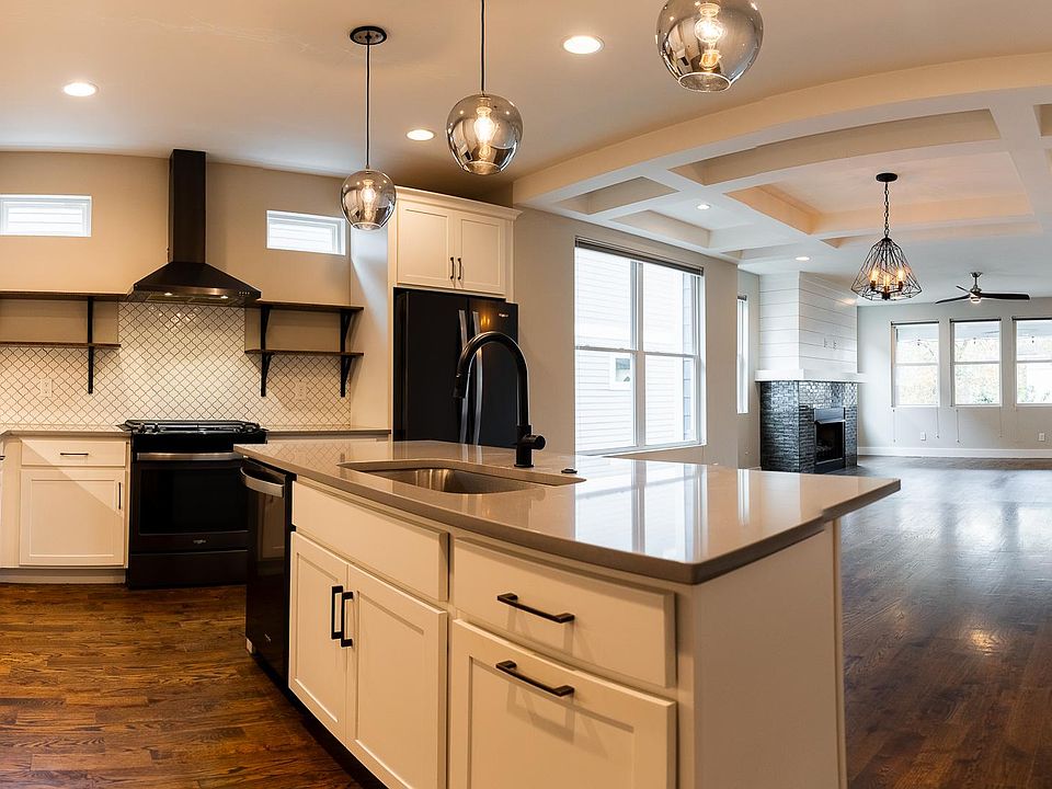 Open plan living, dining and kitchen area.