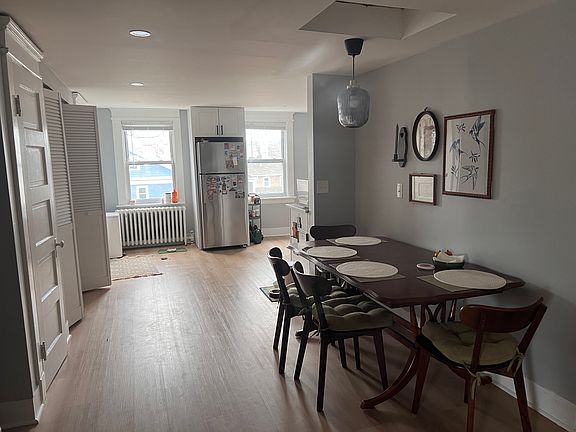 Dining Area; beautiful new flooring throughout the unit.