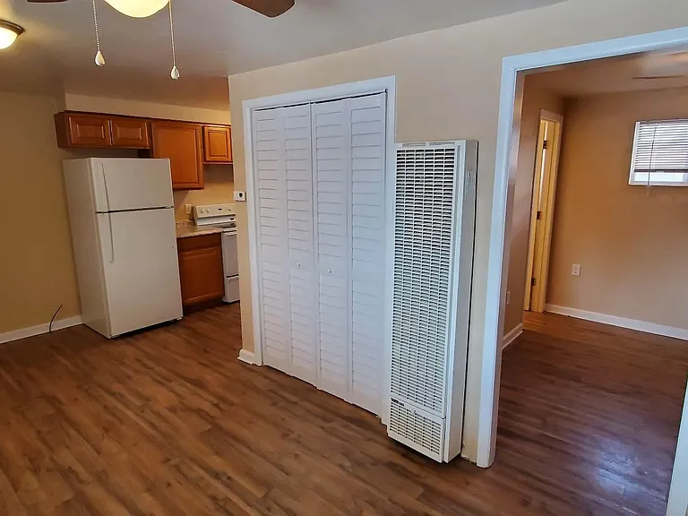 Gas gravity heater in wall.