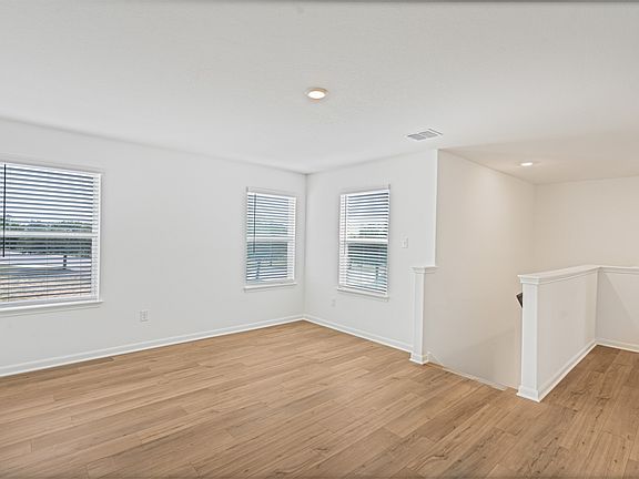 Upstairs loft, perfect for a game room or additional living space.