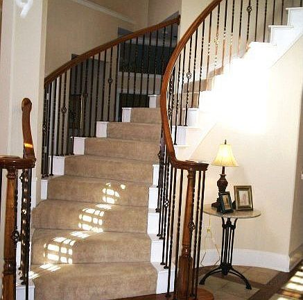 impressive winding front staircase