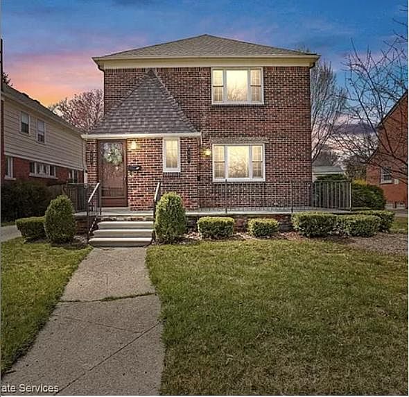 Welcome to 899 Rivard, the lower flat of a two-story duplex in lovely Grosse Pointe. Since this photo was taken, we replaced front walkway, front steps, entire driveway and added brand new 2-car garage!
