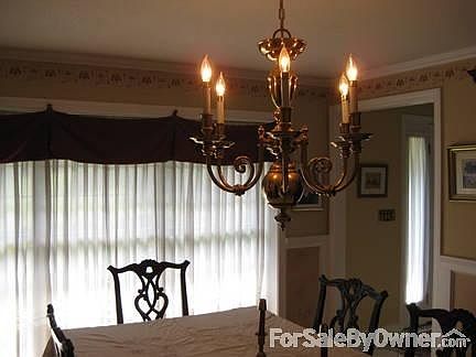 FORMAL DINING ROOM
						:
						ROOM MEASURES 12' X 14' AND IT HAS CROWN MOLDING, CHAIR RAIL AND CHANDELIER