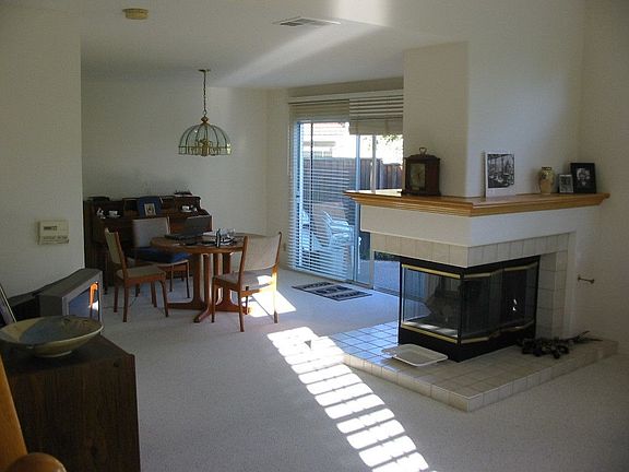 Dining Room opens to Living Room and Kitchen.