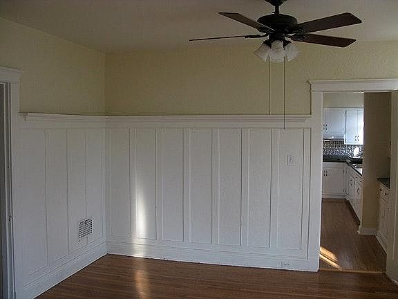 Dining room with plate rail.