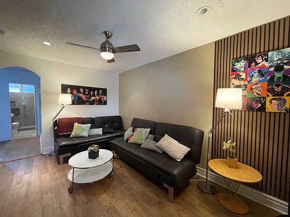 living room with 2 sofa beds