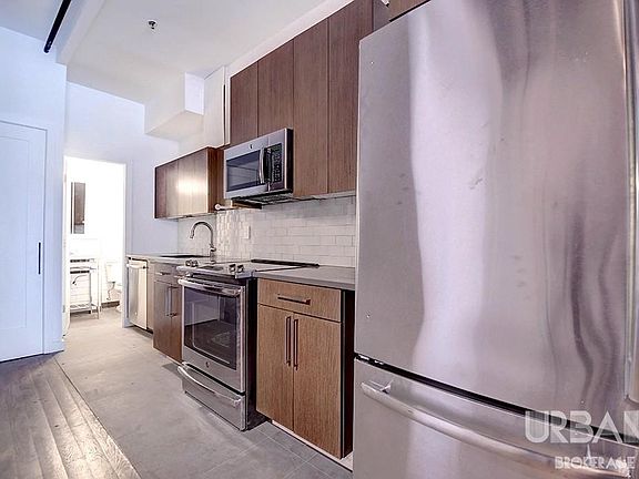 5th image of 86 E 10th St APT 1