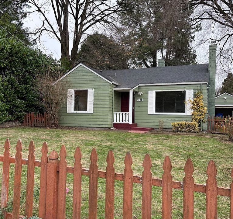 Fully fenced front yard with southern exposure