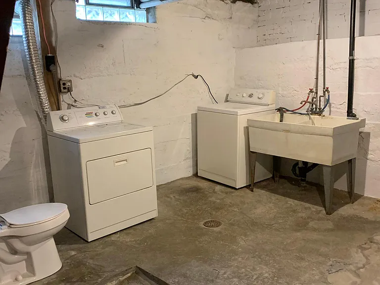 Laundry room and furnace.