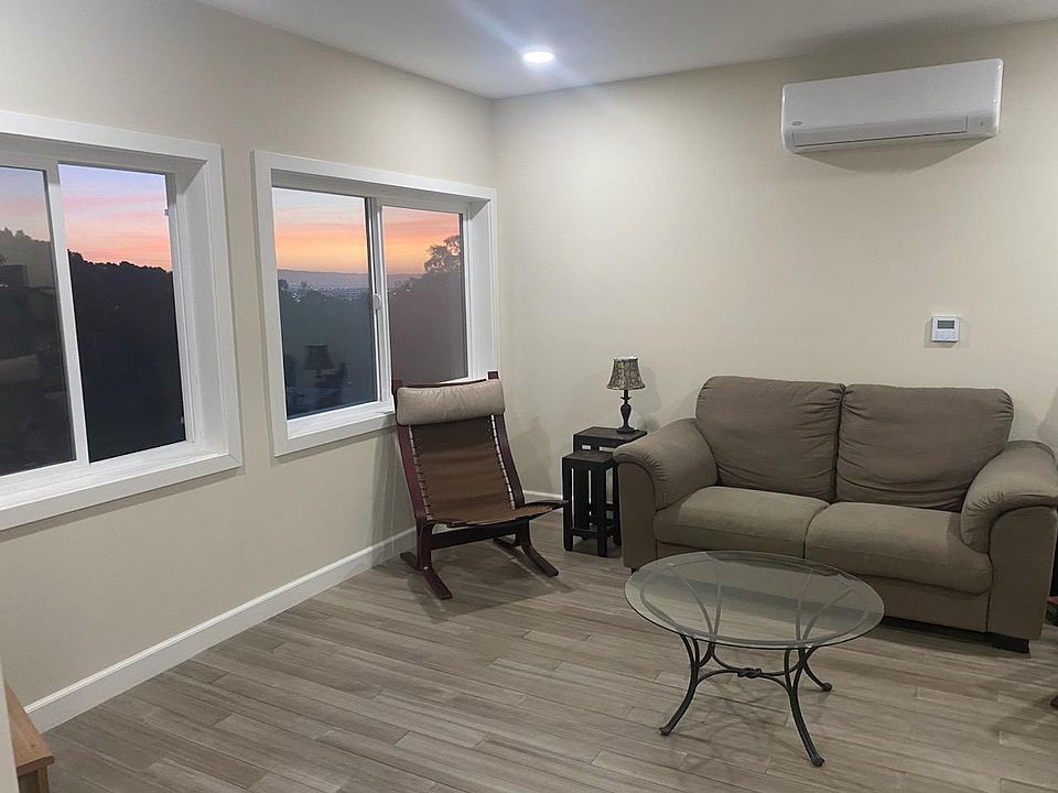 Living room window view at sunset - See all the way to the Bay!