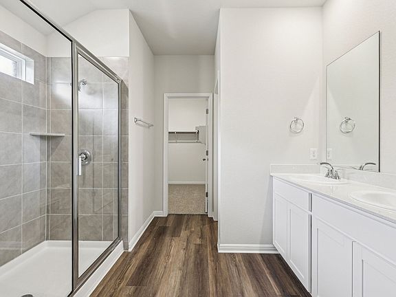 Live in luxury in the primary bathroom.