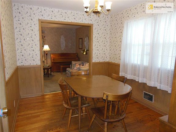 Formal dining room accessed from kitchen and the living room.