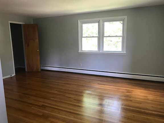 Living room with spacious closet.