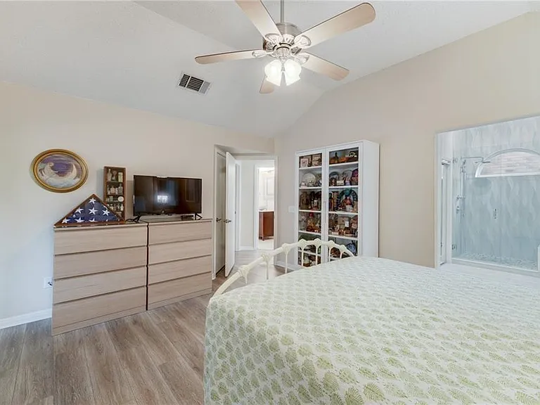 Large primary bedroom with attached primary bath.