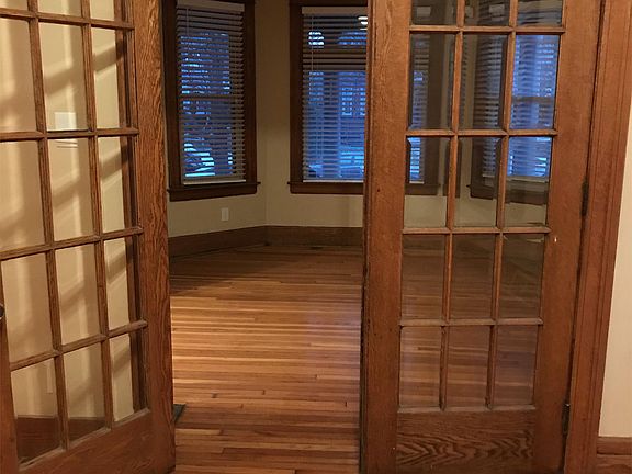 Living Room Space 1 from LR 2 via original glass-paned doors.