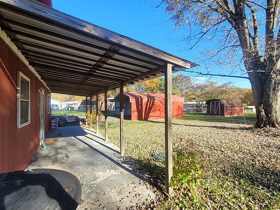 Back porch, carport, shed