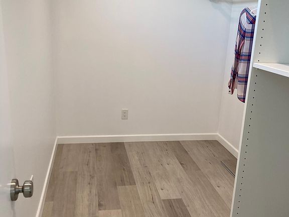 Huge walk in closet with window