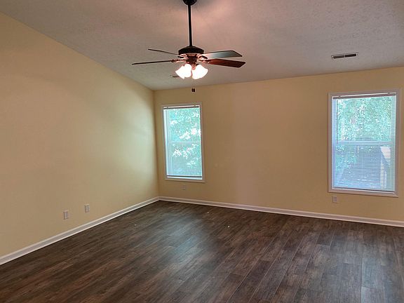 family room with vaulted ceiling