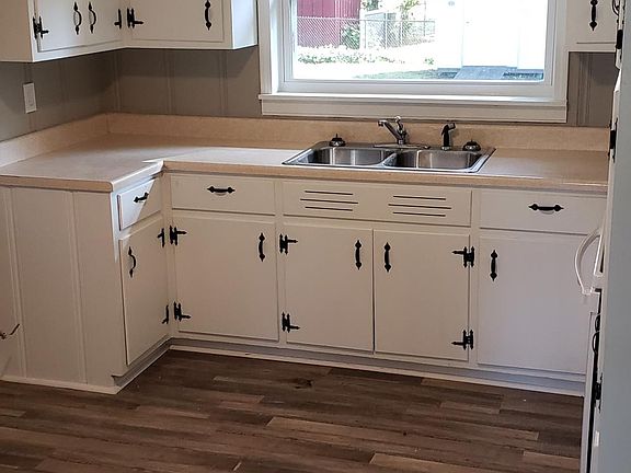 New flooring and lighting throughout.