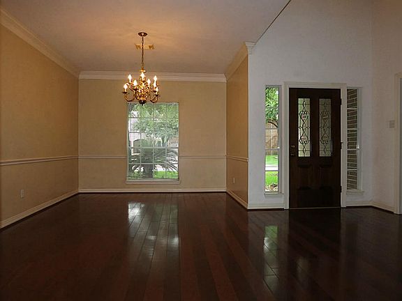 Gathering in a nice spacious formal dinning room.