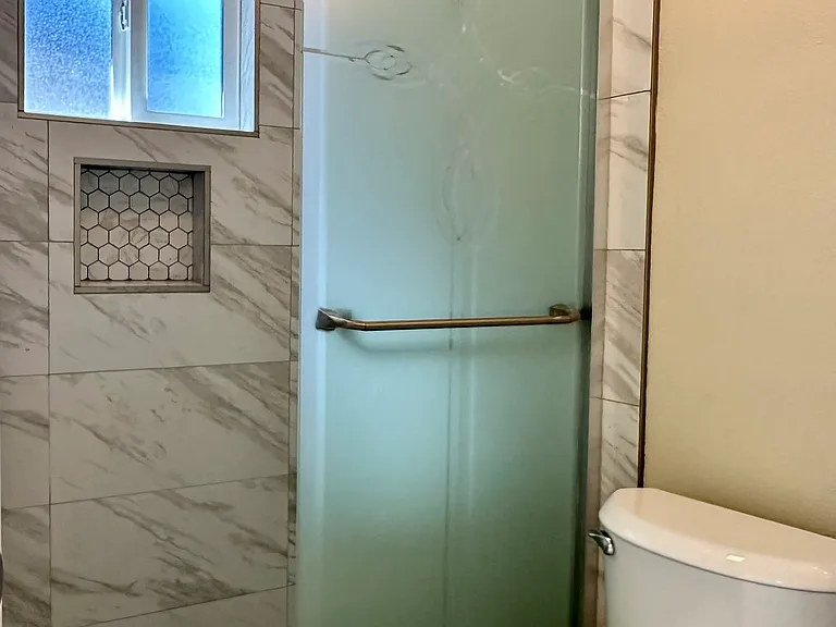 Updated full bathroom with walk-in shower