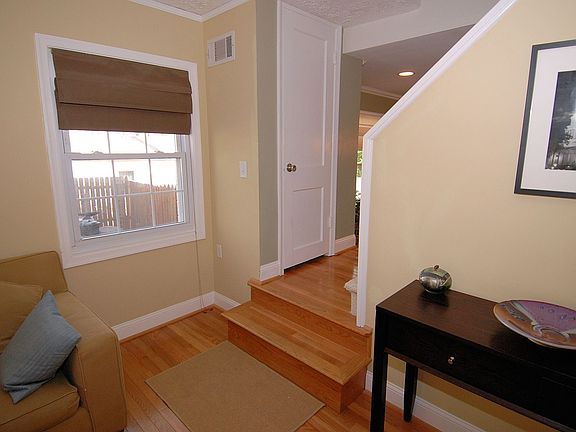 Stairs to dining/living room and upper level