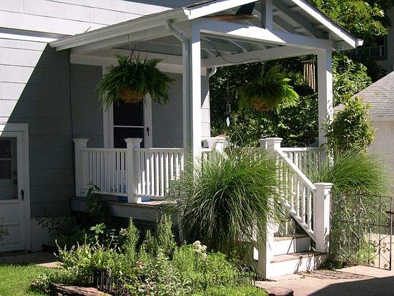 Rear porch, outdoor shower.
