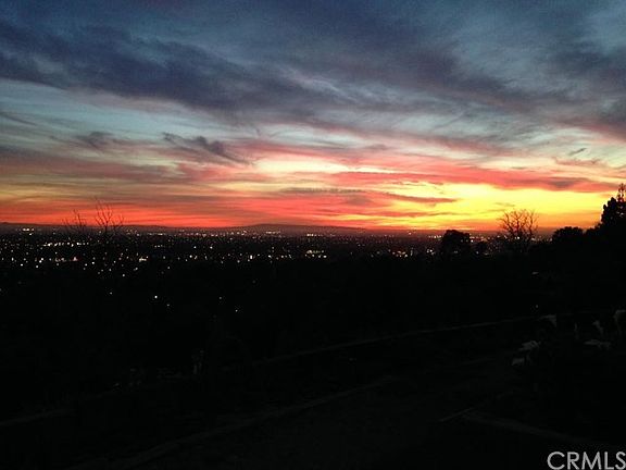 This is one of the Awesome Sunsets!!! I will ask the owner if that is Catalina or Palos Verdes... I will get back to you on that.  I love it!