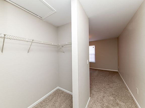 Cozy bedroom with carpet & large closet