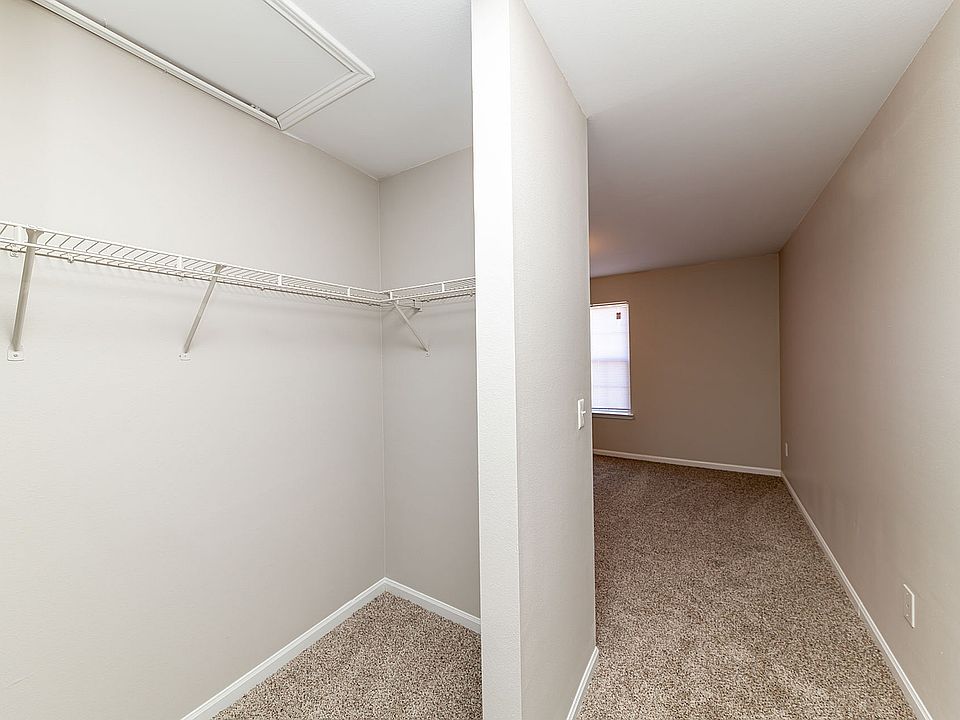 Cozy bedroom with carpet & large closet