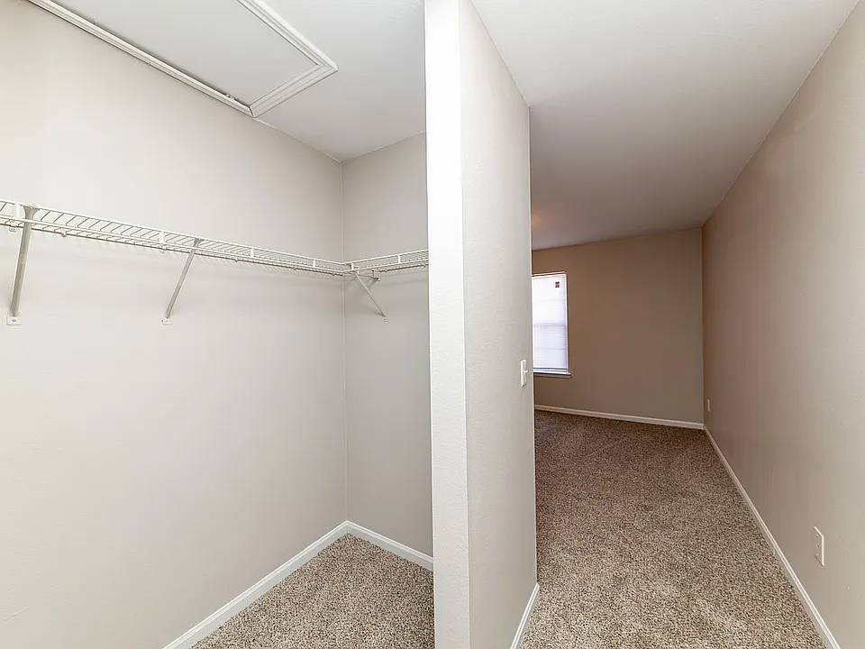Cozy bedroom with carpet & large closet