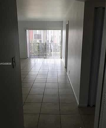 2nd image of 8610 N Sherman Cir APT 406