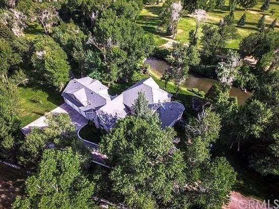 Aerial View of Home, River & Golf Course