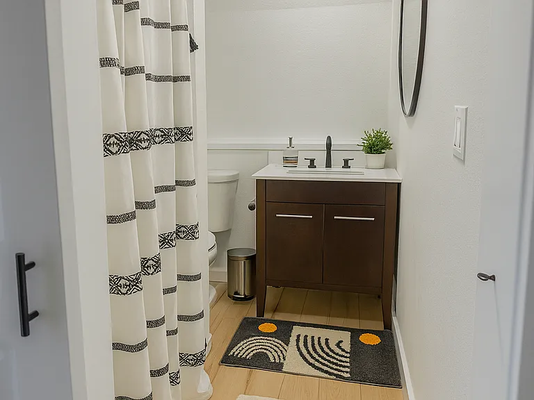 Clean, modern bathroom to make your stay feel elevated and cheerful