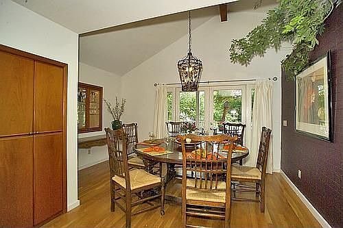 Elegant dining room opens out to dining porch