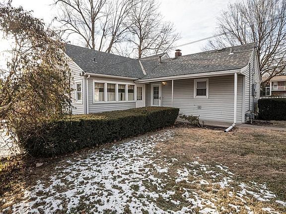 The covered back porch brings you into the back door.
