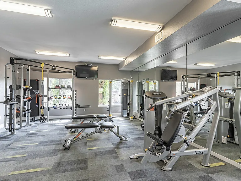 Elevate your fitness routine with our premium apartment gym, featuring cutting-edge equipment and a spacious layout.