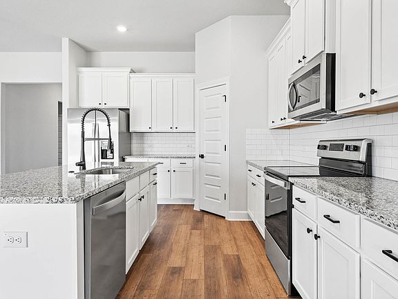 The kitchen has energy-efficient appliances.