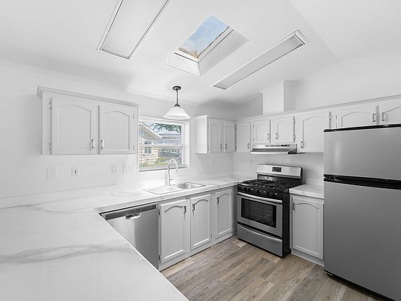 2nd image of 2600 N Hill Field Rd #103A