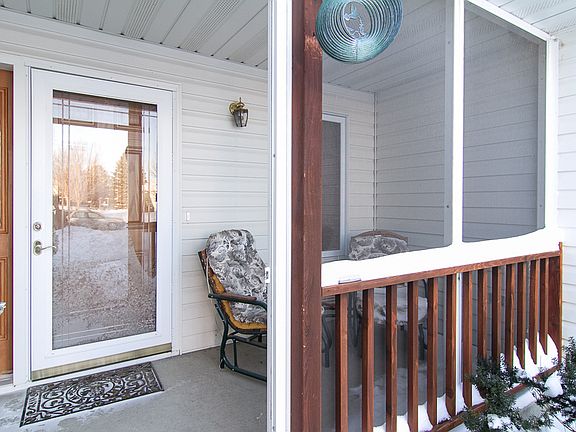 Screened-in front porch