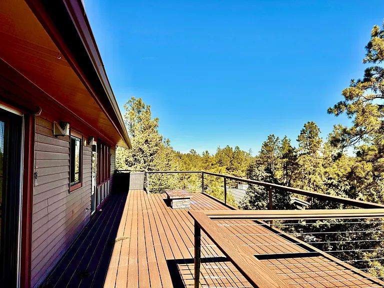 Massive brand new trax deck. Room for dining, lounge chairs, fire pit seating, bbq area and more.