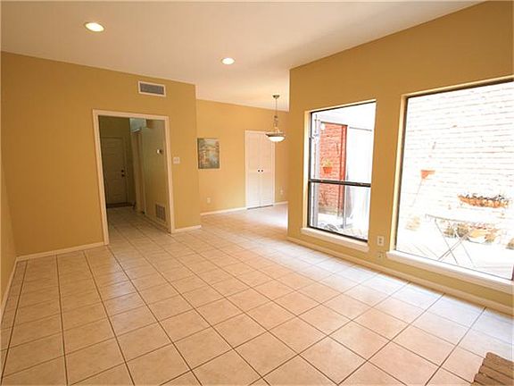 Another view of the living room with large windows overlooki