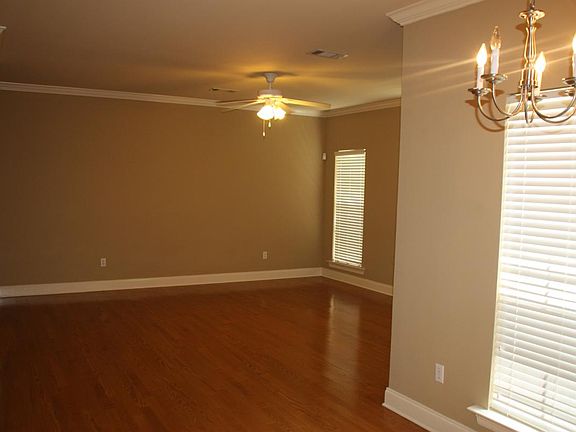 Large living room with wood floors