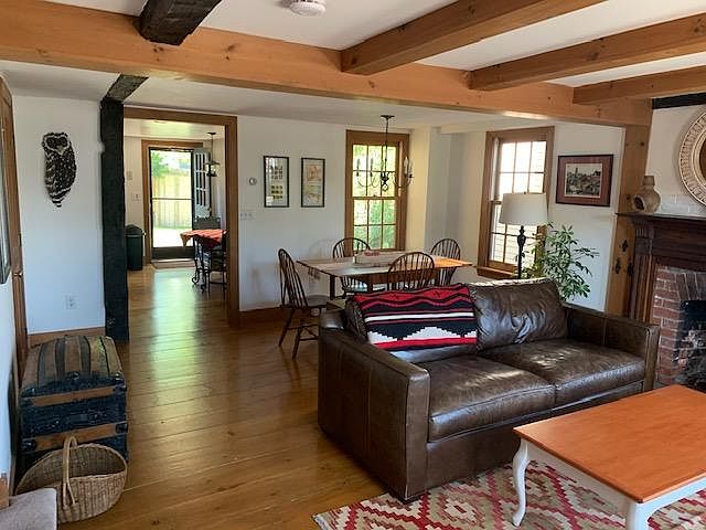 Living/dining/ looking through kitchen to back yard